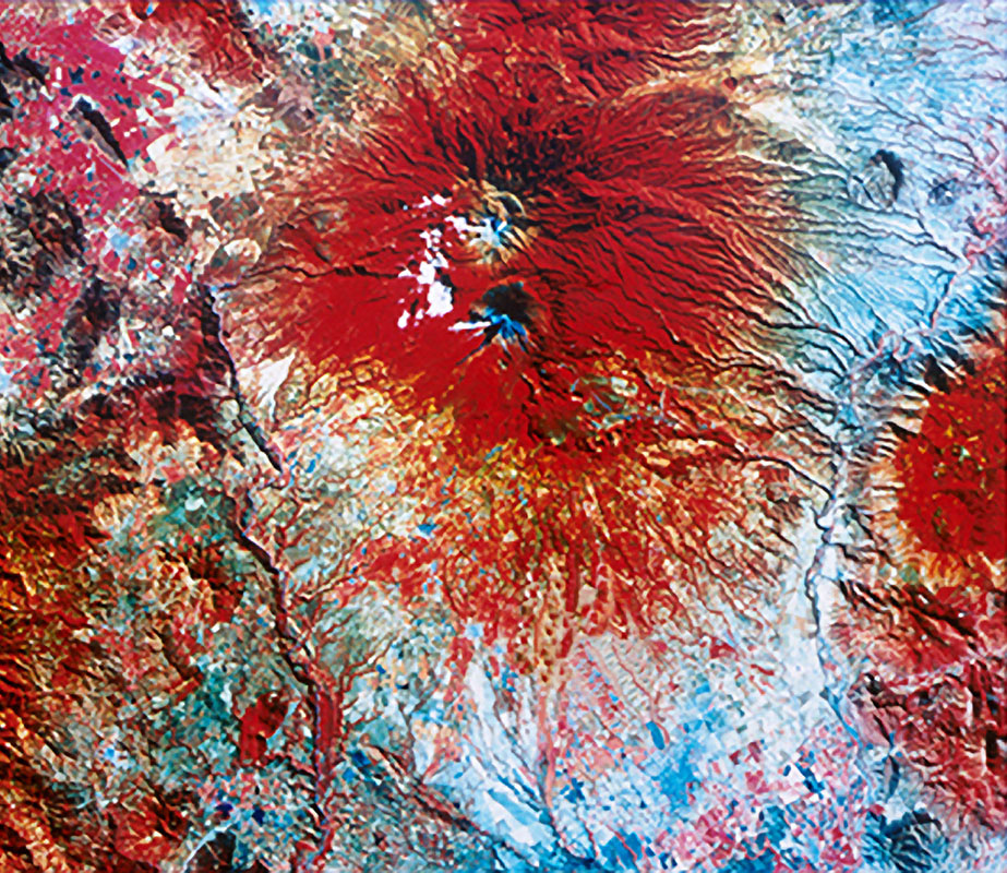 The two Volcanes de Colima, Nevado (at top) and Fuego (below), are distinguishable in this satellite view. (USGS)
